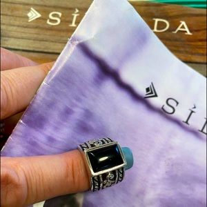 Retired Silpada wide band silver and chalcedony ring.